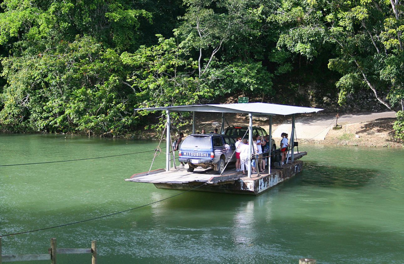 Hand-cranked ferry crossing in Belize